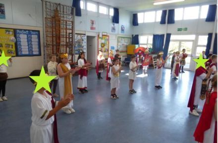 35 Y4 Roman Day. Pupils in period costume in hall.