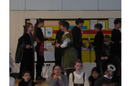 38 Y6 Macbeth Delight Performance. Pupils acting in costume.