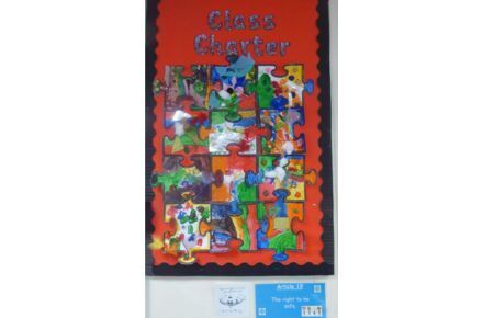 RRSA Class Charter Displays. Collage of large coloured jigsaw pieces on red background.