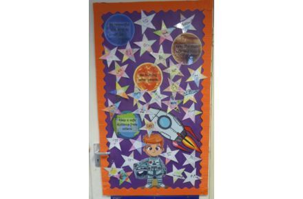 Y1 Class Charter. Orange and purple poster with stars.