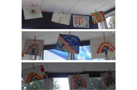 Y3 PSHCE and Art. Posters hung up showing rainbows.
