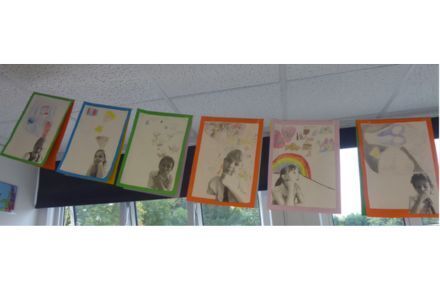 Y4 PSHCE. Posters hanging up on rope.