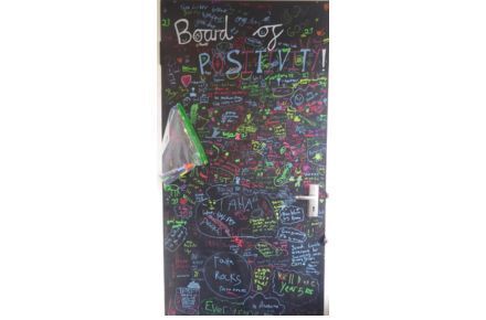 Y5 Positivity board. Black board with positive affirmations.