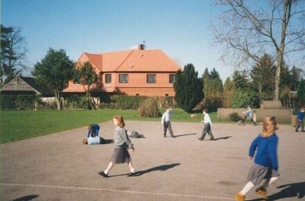 Junior playground 1994. Pupils playing in playground.