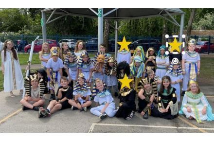 5 Y3 Egypt Immersion Day. Group shot of pupils dressed up.