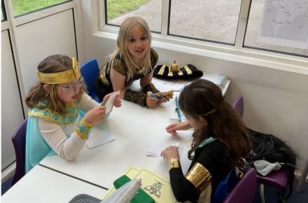 6 Y3 Egypt Immersion Day. Pupils at table crafting.
