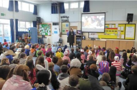 12 World Book Day. Pupils in assembly.