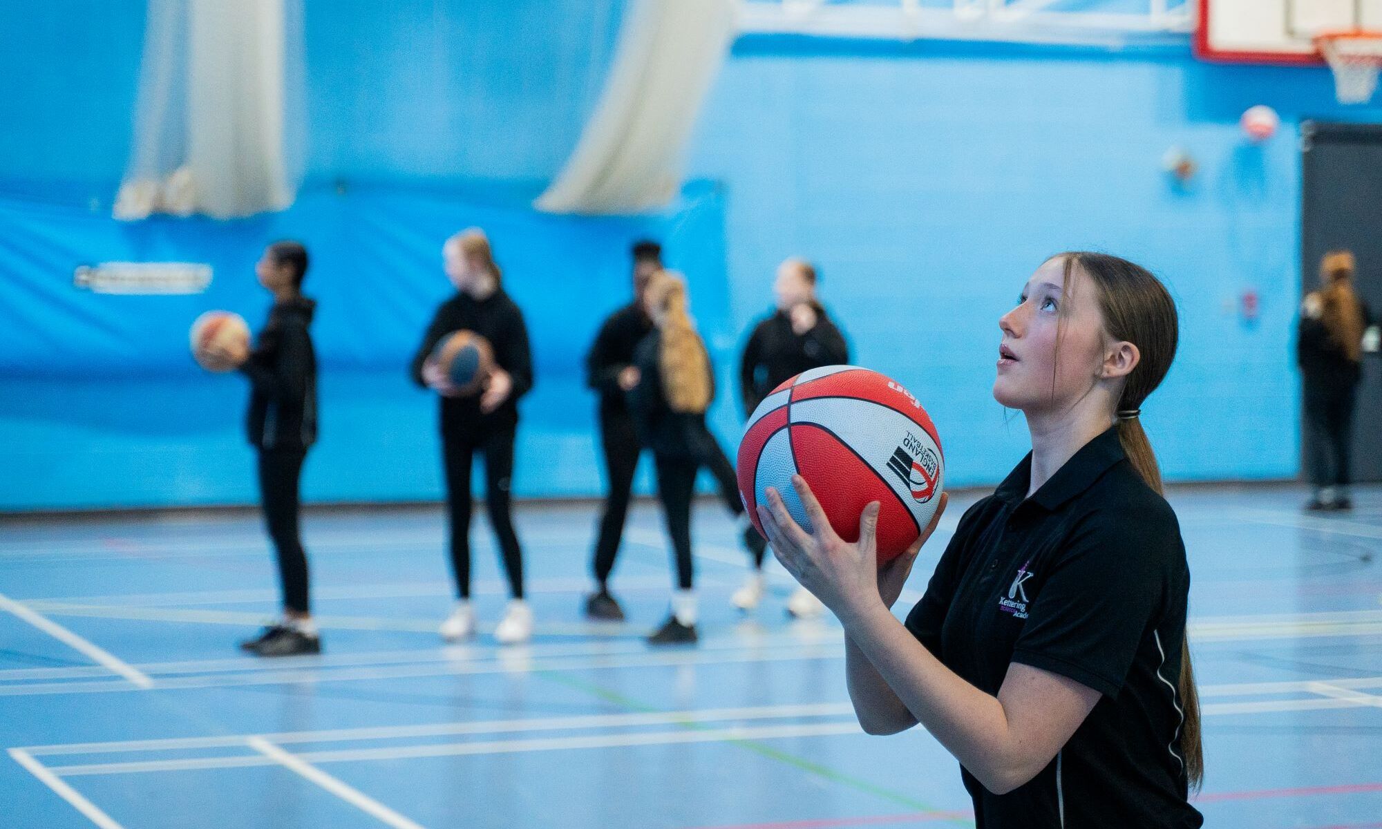 Kettering Science Academy - Student about to throw a ball