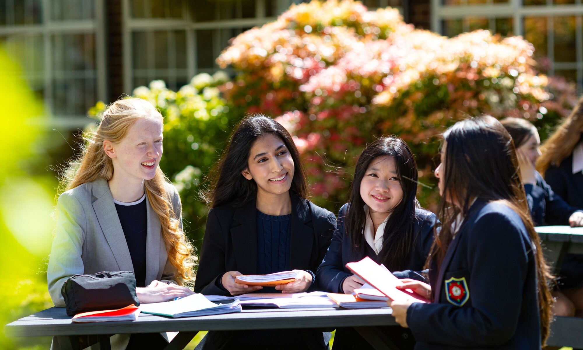 Students around bench in quad