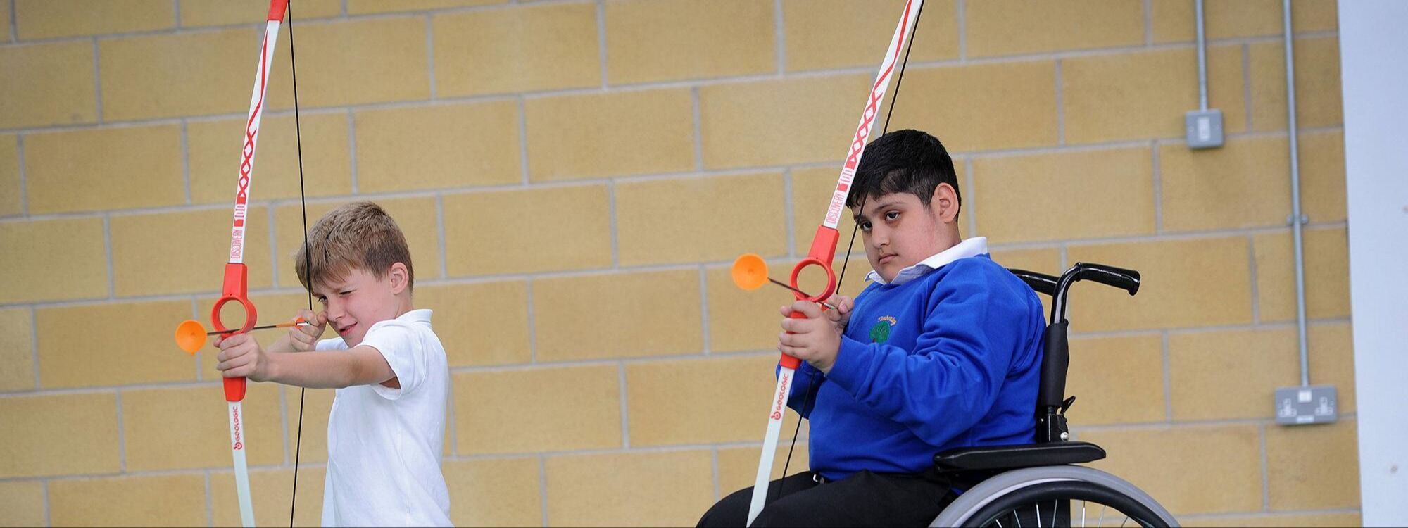 Timberley academy pupils doing archery